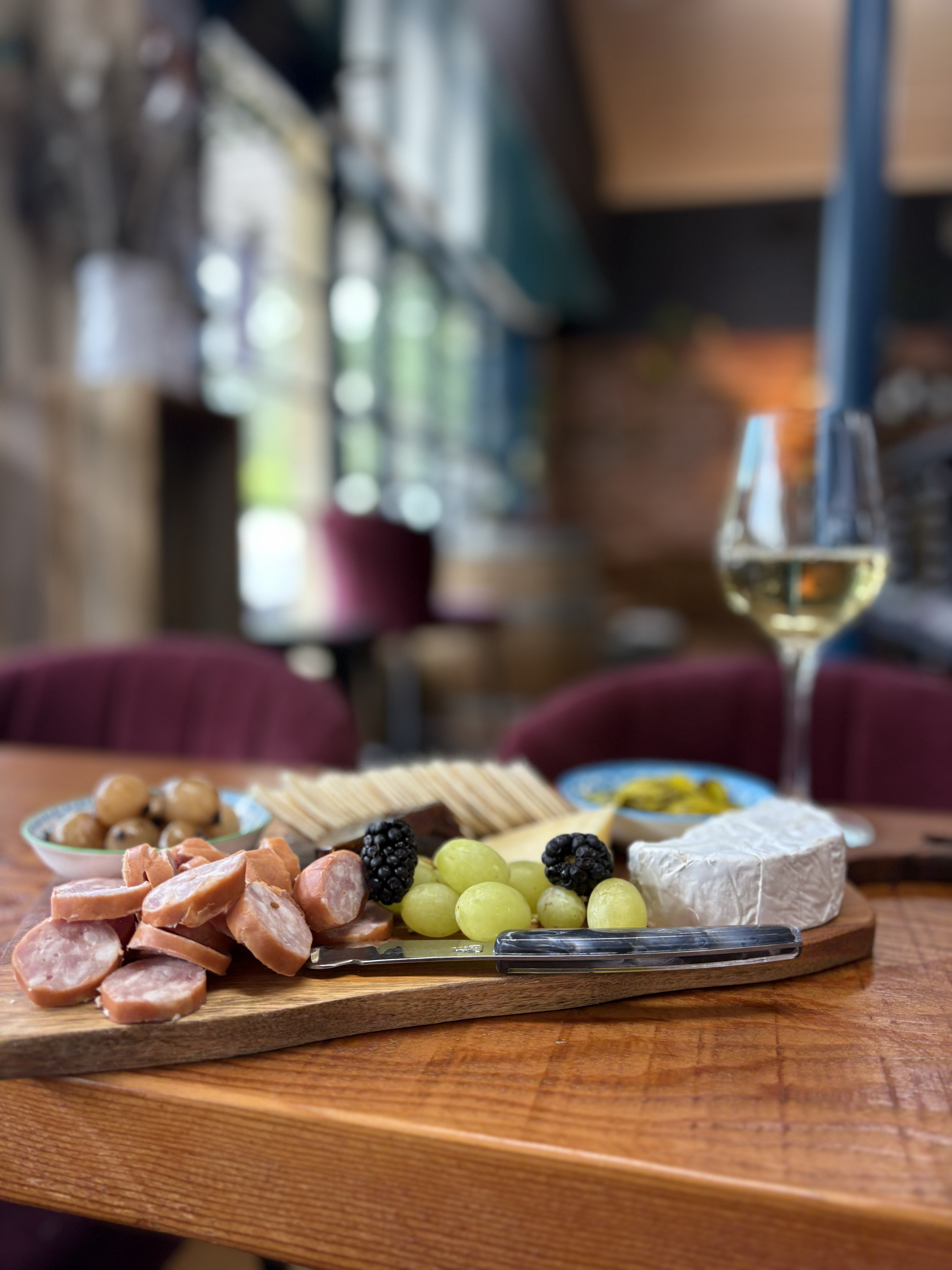The wine bar grazing board with wine